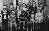 A birthday party held for the children of the Moalem family. (1937)