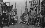 Nanking Road looking west. Trams travelled along this main street. Note the banners.